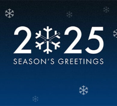 Key visual for the holiday season 2024/2025 with Season's Greetings and some snowflakes.