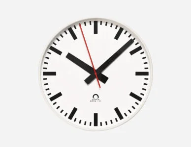Mobatime Flex indoor analogue clock front view white housing