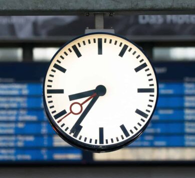 Front view of an illuminated Deutsche Bahn clock